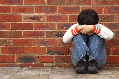 bully stock photo|picture of someone being bullied.